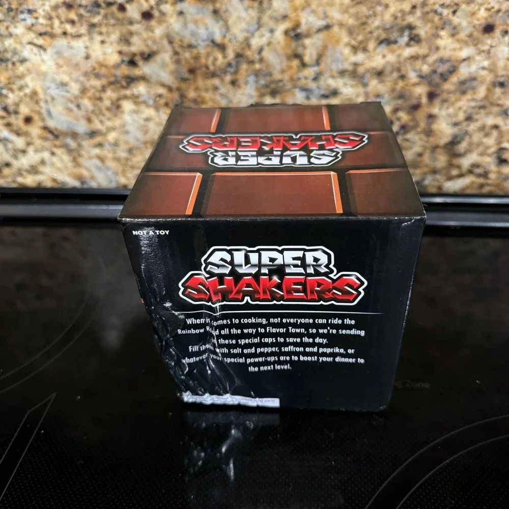 The Super Mario Bros. Salt & pepper shakers Mario & Luigi Hats set by Geek Fuel.